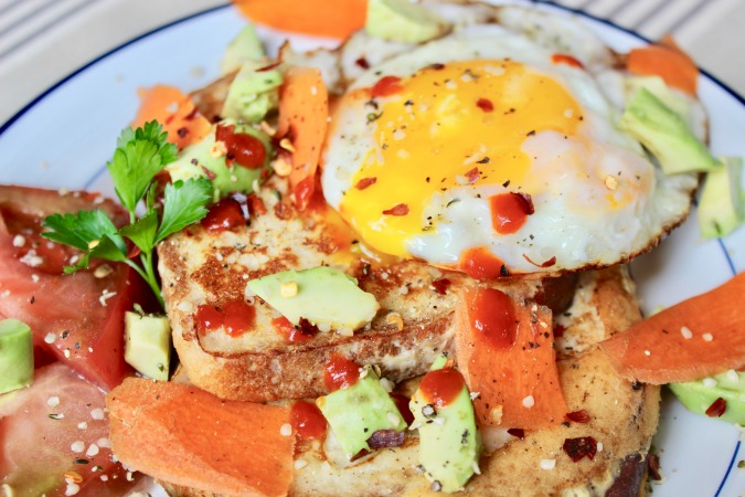 Top this Savory Cheese & Hummus French Toast brinner with an egg over easy. The yolk becomes the most amazing syrup!