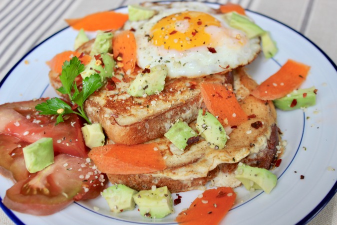 This Savory Cheese & Hummus French Toast may look like a lot, but this was the EASIEST thing to throw together.  All you need for the eggy dip is some egg white and hummus.  It's not that strange... it's really just savory eggs with bread.