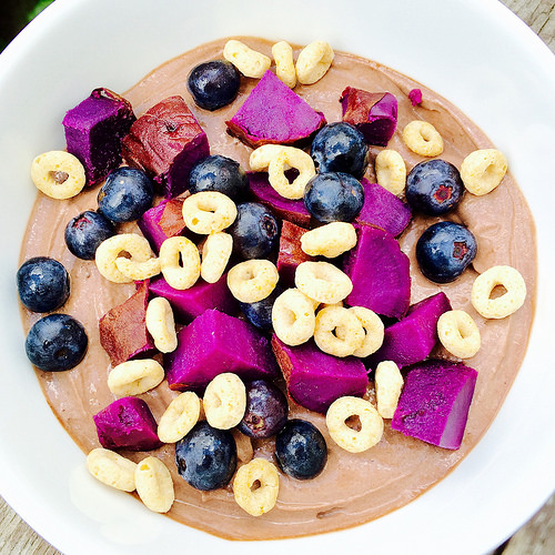 Chocolate Greek Yogurt Bowl... topped with purple sweet potatoes, blueberries, and Cheerios. It's good. I swear.