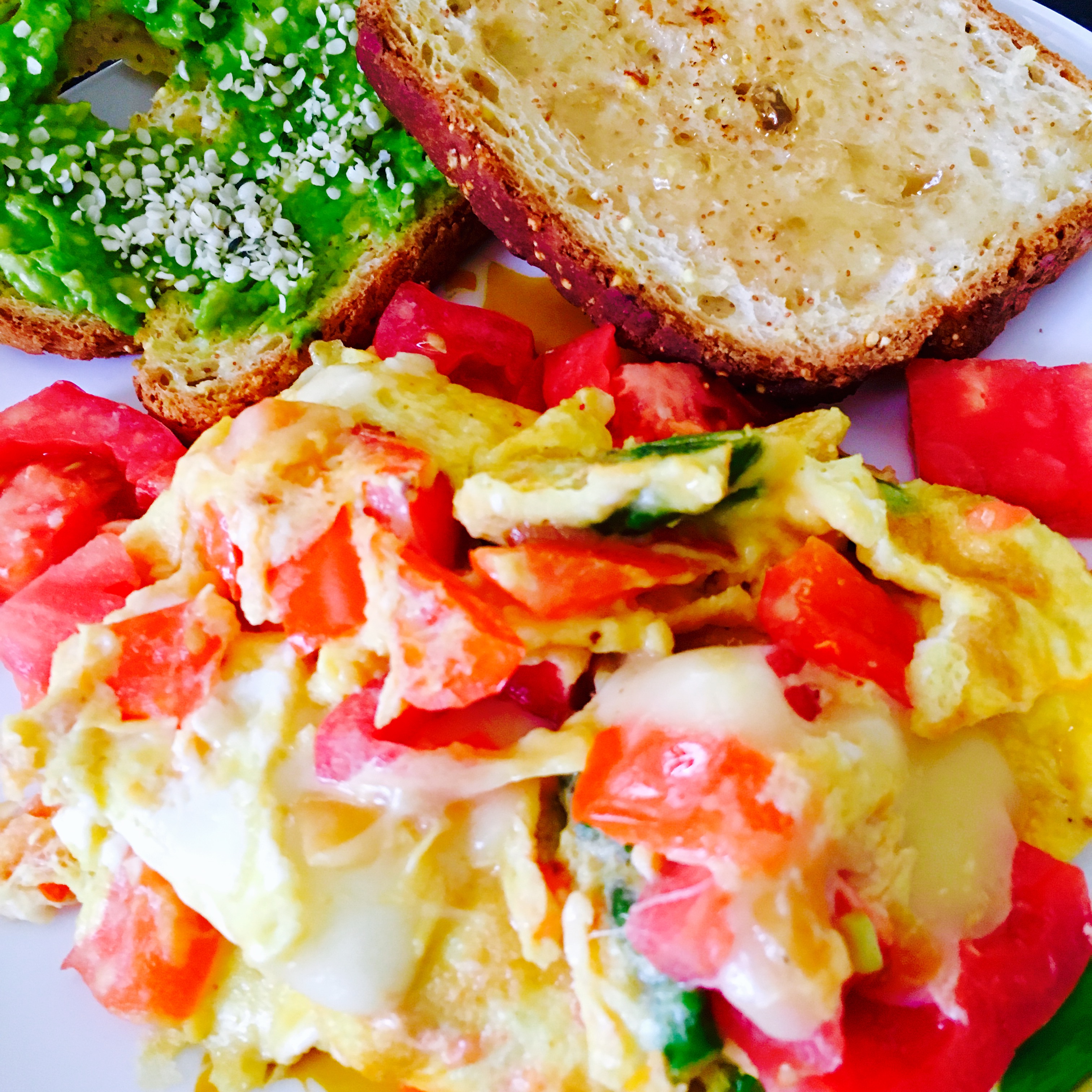 Egg scramble with smashed avocado and jelly toast