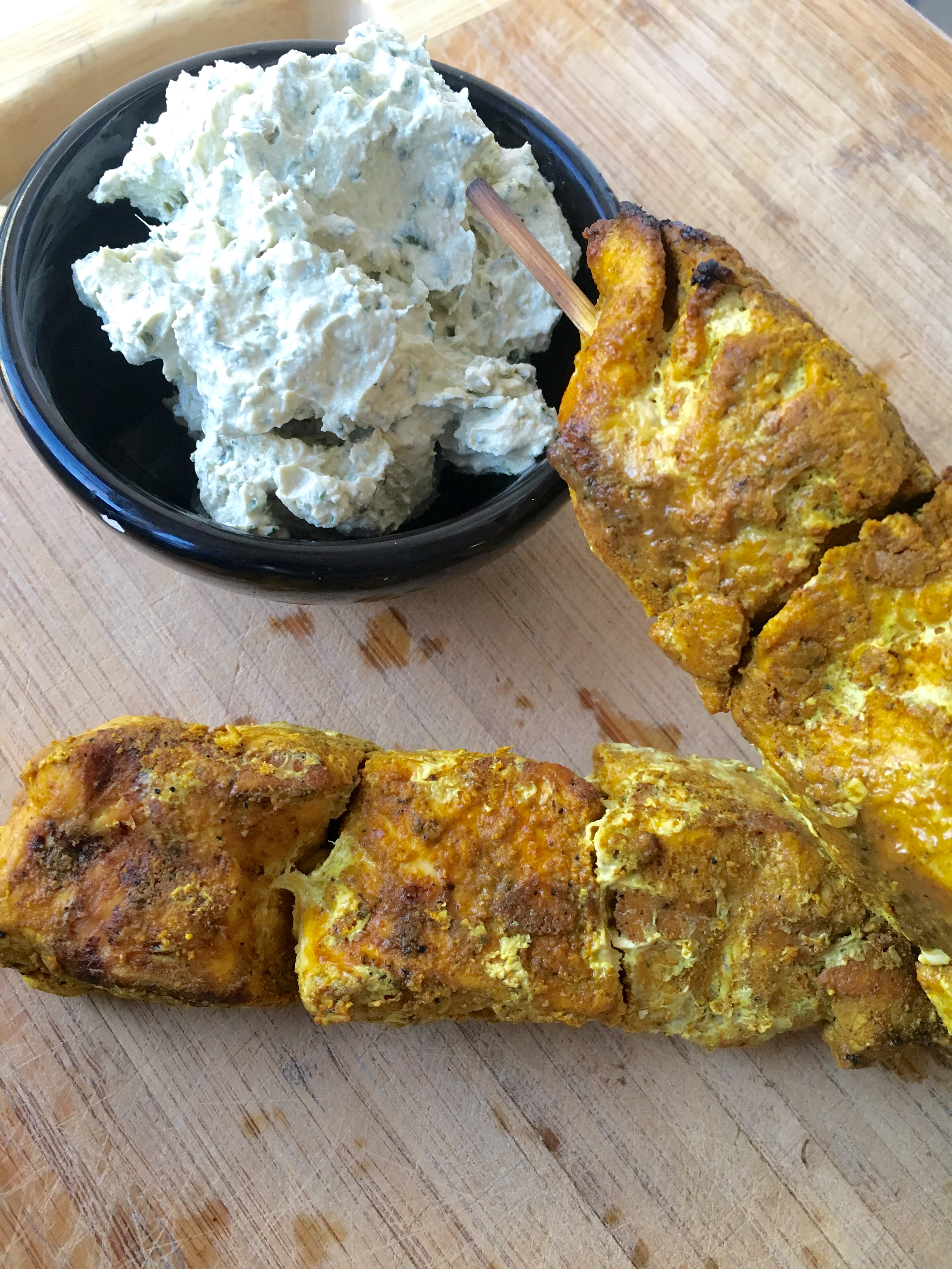 Try these flavorful Middle Eastern Spiced Chicken Skewers with Herbed Tahini Sauce on the grill this summer!