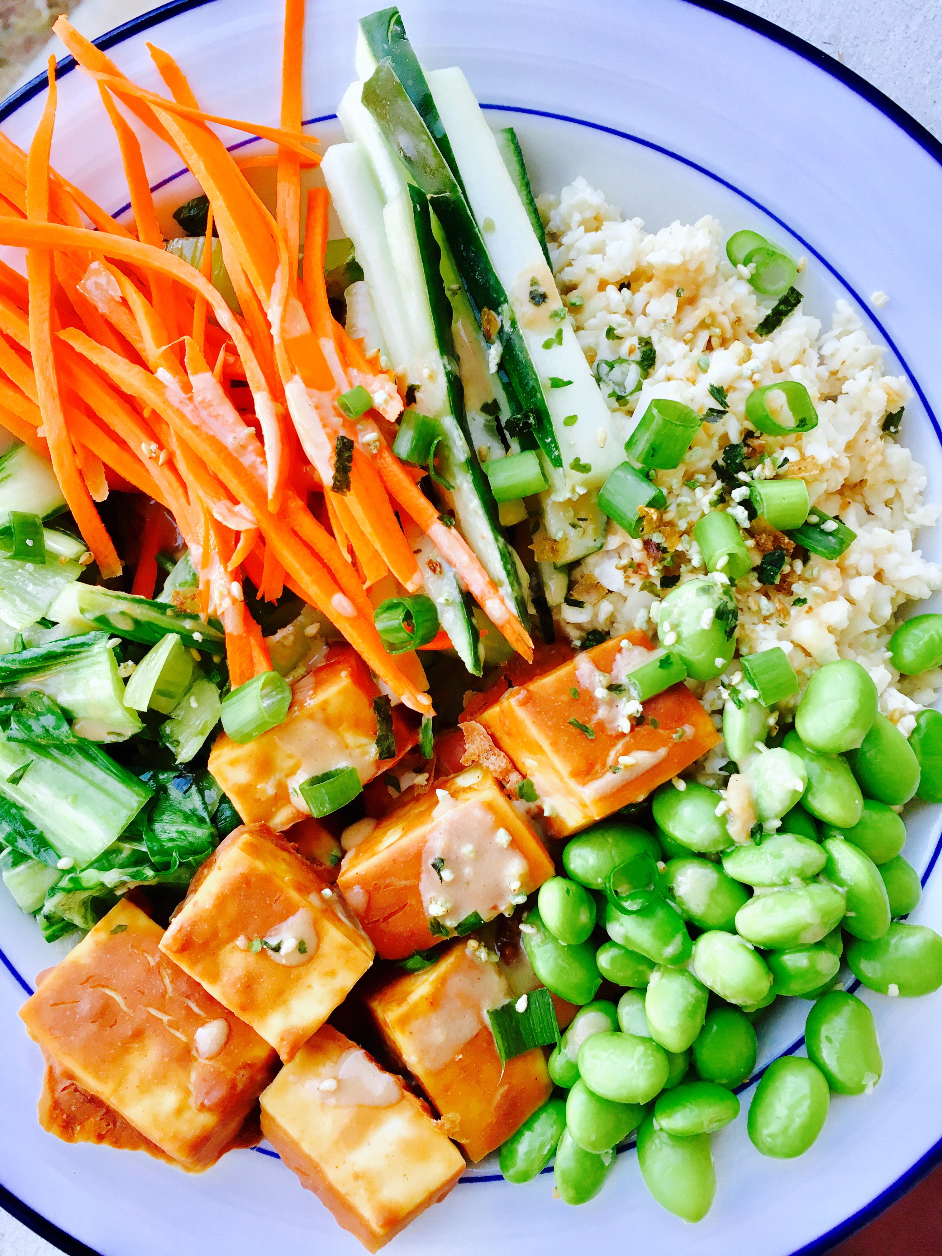 Sriracha Peanut Tofu Power Bowl with Ginger-Tahini Dressing and Cauliflower Rice