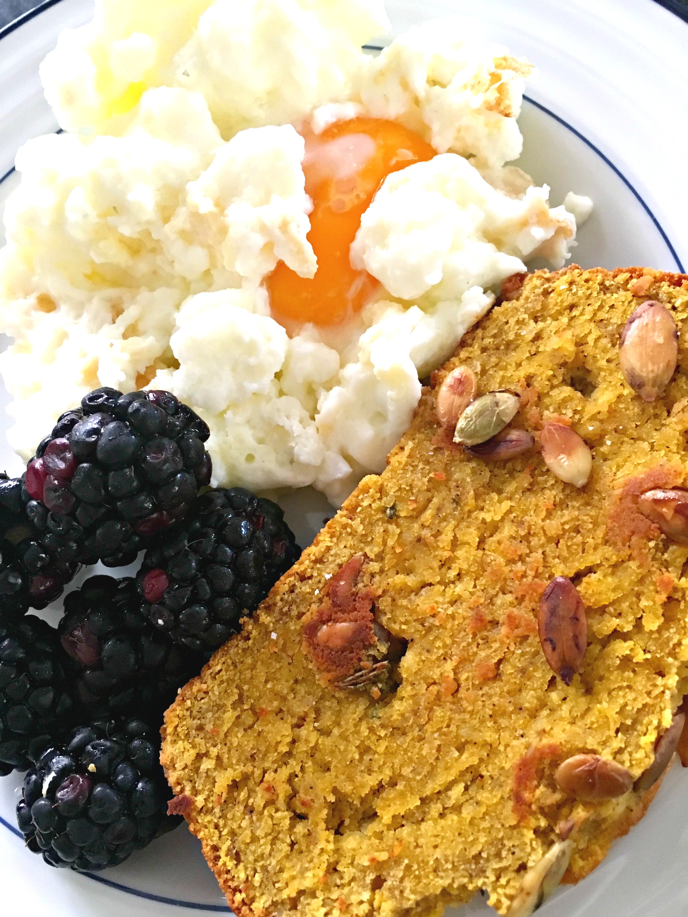 Pumpkin bread, eggs, and blackberries