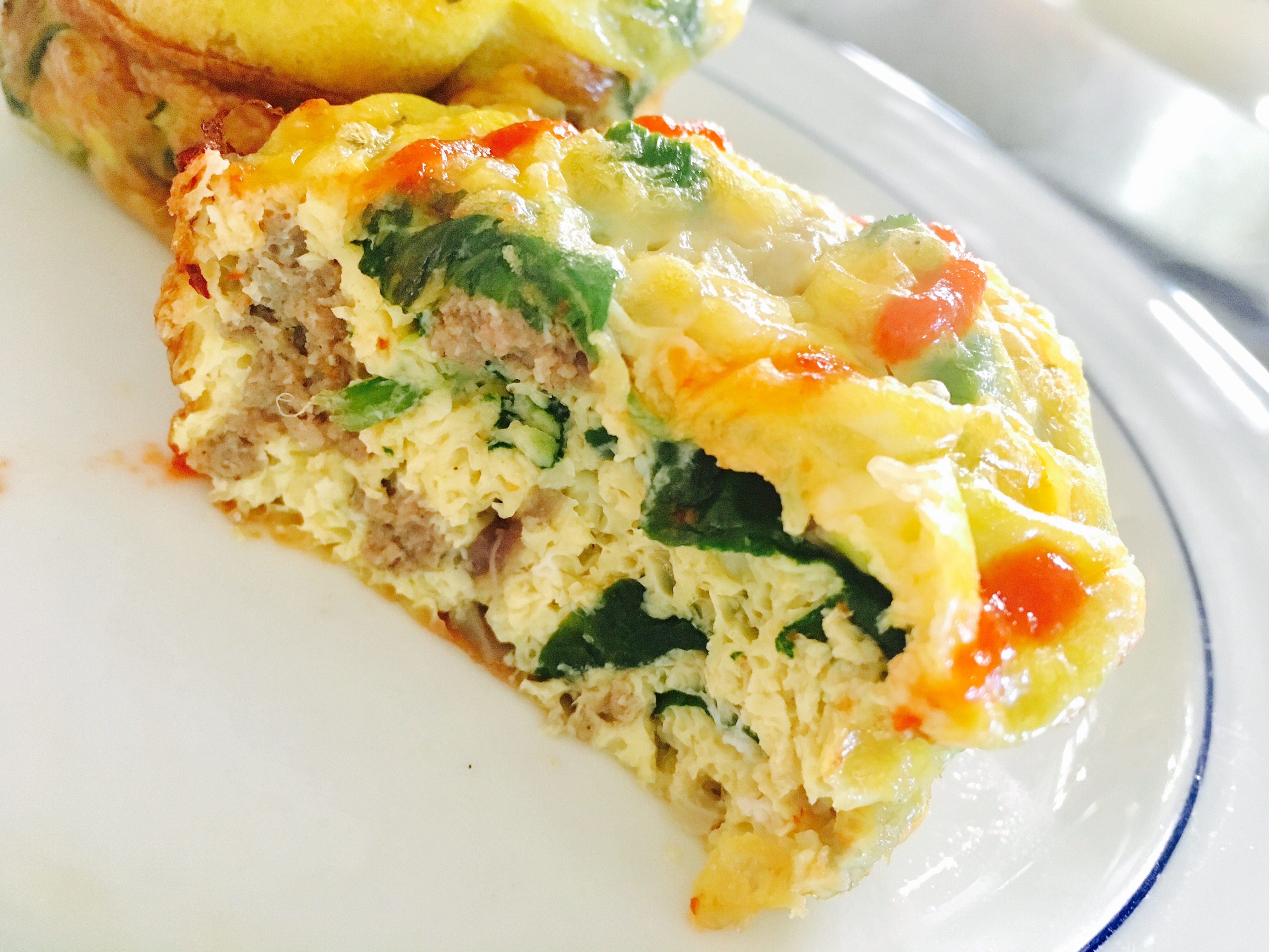 Egg muffins with turkey sausage and asparagus are easy to make and even easier to eat! They can be made ahead of time and reheated for the perfect grab and go breakfast.