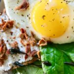 Ricotta toast with bacon sprinkles and #yolkporn