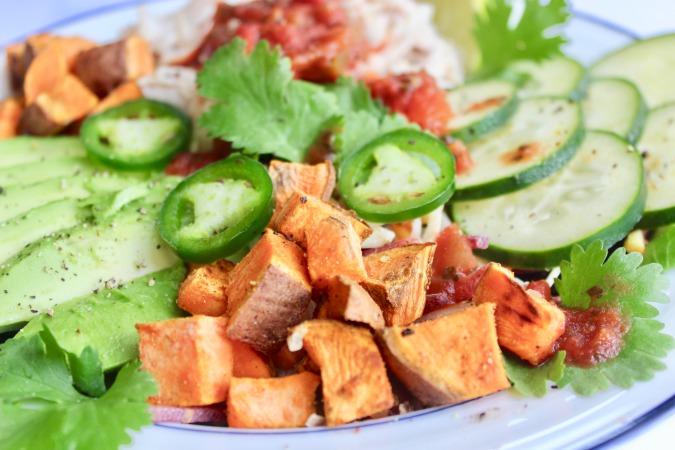 There aren't many ingredients in this 5-minute chicken taco bowl recipe, and the only thing you have to cook is a sweet potato.  The cumin and flaky salt are perfection against its natural sweetness.